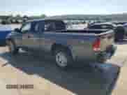 2002 Dodge Dakota Sport z VIN 1B7GL32XX2S588725, wystawiony jako Copart lot #65541345 z przebiegiem 205 568 mil mil oraz Szkoda całkowita • Salvage title. Historia ofert i sprzedaży dostępna na DreamBid. Obrazek 2.