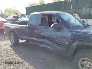 ✅ 1999 Dodge Dakota SLT • VIN: 1B7GG22X8XS115282 • Lot: 42136576. Wystawiony na IAAI z przebiegiem 220 465 mil. Bezpłatny archiwum sprzedaży aukcyjnych z USA i szczegółowy raport historii pojazdu na DreamBid. Zdjęcie 6.