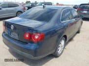 ✅ 2010 Volkswagen Jetta Limited Edition • VIN: 3VWRX7AJ1AM067933 • Lot: 42153235. Listed on IAAI with 127,051 mi. Free auction sales archive from the USA and detailed vehicle history report at DreamBid. Image 4.