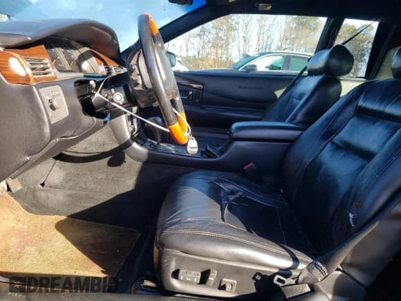 ✅ 2000 Cadillac Eldorado • VIN: 1G6EL12Y5YB700430 • Лот: 42323245. Опубликован ранее на Copart с пробегом 169 601 миль. Бесплатный доступ к архиву аукционных продаж из США и подробный отчёт об истории автомобиля на DreamBid. Изображение 7.