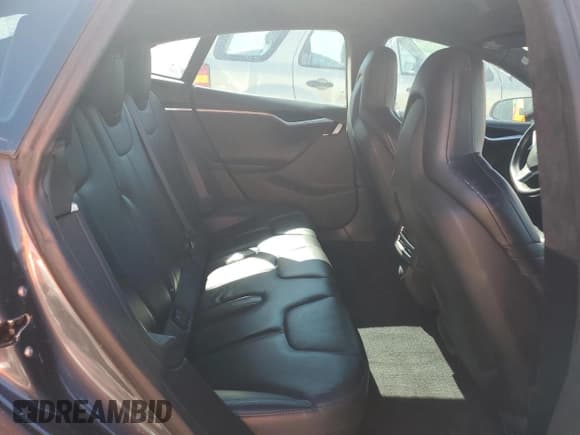 ✅ 2015 Tesla Model S 85 • VIN: 5YJSA1H18FF099766 • Lot: 90036645. Listed on Copart with 101,607 mi. Free auction sales archive from the USA and detailed vehicle history report at DreamBid. Image 11.