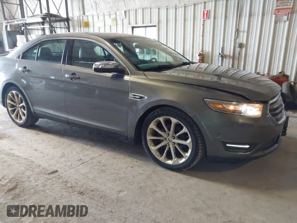 ✅ 2013 Ford Taurus Limited • VIN: 1FAHP2F85DG166167 • Lot: 42529202. Listed on IAAI with 128,945 mi. Free auction sales archive from the USA and detailed vehicle history report at DreamBid. Image 1.