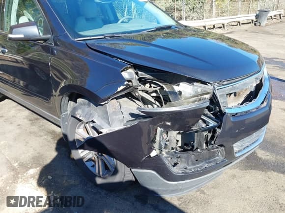 ✅ 2015 Chevrolet Traverse LT • VIN: 1GNKRHKD3FJ213788 • Lot: 43610974. Listed on IAAI with 199,161 mi. Free auction sales archive from the USA and detailed vehicle history report at DreamBid. Image 6.