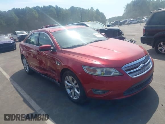 ✅ 2010 Ford Taurus SEL • VIN: 1FAHP2EW4AG151252 • Lot: 43296843. Listed on IAAI with 153,669 mi. Free auction sales archive from the USA and detailed vehicle history report at DreamBid. Image 1.