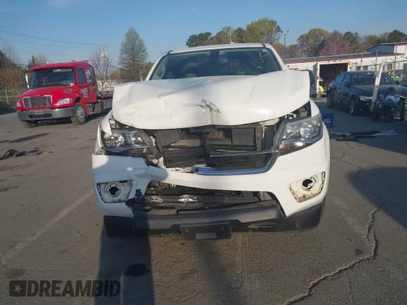 ✅ 2018 Chevrolet Colorado 2WD Work Truck • VIN: 1GCHSBEA2J1148544 • Lot: 41907661. Listed on IAAI with 106,326 mi. Free auction sales archive from the USA and detailed vehicle history report at DreamBid. Image 12.