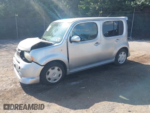 ✅ 2009 Nissan Cube S • VIN: JN8AZ28R99T106634 • Lot: 42929559. Wystawiony na IAAI z przebiegiem 228 284 mil. Bezpłatny archiwum sprzedaży aukcyjnych z USA i szczegółowy raport historii pojazdu na DreamBid. Zdjęcie 2.