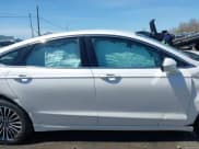 ✅ 2018 Ford Fusion Titanium • VIN: 3FA6P0D95JR154967 • Lot: 42133178. Listed on IAAI with 65,219 mi. Free auction sales archive from the USA and detailed vehicle history report at DreamBid. Image 12.