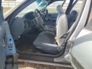 ✅ 1995 Buick Regal Custom • VIN: 2G4WB52M8S1434963 • Lot: 77606034. Wystawiony na Copart z przebiegiem 586 301 mil. Bezpłatny archiwum sprzedaży aukcyjnych z USA i szczegółowy raport historii pojazdu na DreamBid. Zdjęcie 7.