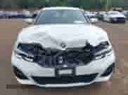 2020 BMW 3 Series 330i xDrive z VIN 3MW5R7J04L8B19857, wystawiony jako IAAI lot #43293574 z przebiegiem 19 853 mil mil oraz . Historia ofert i sprzedaży dostępna na DreamBid. Obrazek 12.