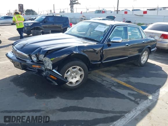 ✅ 2003 Jaguar XJ 8 • VIN: SAJDA14C03LF58706 • Lot: 41619740. Listed on IAAI with 95,293 mi. Free auction sales archive from the USA and detailed vehicle history report at DreamBid. Image 2.