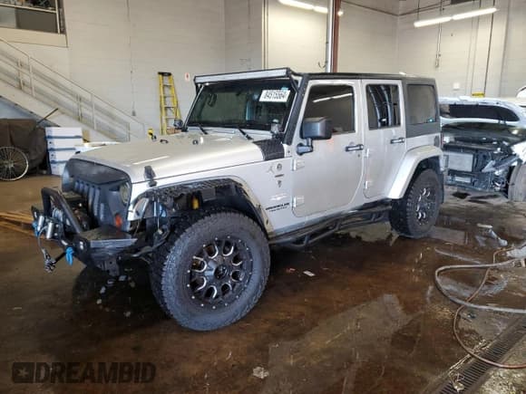 ✅ 2011 Jeep Wrangler Unlimited Sahara • VIN: 1J4HA5H12BL633055 • Lot: 84515564. Wystawiony na Copart z przebiegiem 138 603 mil. Bezpłatny archiwum sprzedaży aukcyjnych z USA i szczegółowy raport historii pojazdu na DreamBid. Zdjęcie 1.