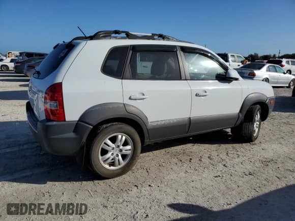 2007 Hyundai Tucson SE z VIN KM8JN12D47U641209, wystawiony jako Copart lot #77636264 z przebiegiem Nie podano mil oraz Szkoda całkowita • Salvage title. Historia ofert i sprzedaży dostępna na DreamBid. Obrazek 3.