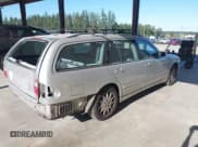 ✅ 2001 Mercedes-Benz E 320 • VIN: WDBJH65J51B340718 • Lot: 42666609. Listed on IAAI with 166,444 mi. Free auction sales archive from the USA and detailed vehicle history report at DreamBid. Image 4.