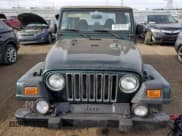 ✅ 2000 Jeep Wrangler Sahara • VIN: 1J4FA59S6YP739265 • Лот: 87437674. Опубликован ранее на Copart с пробегом 208 638 миль. Бесплатный доступ к архиву аукционных продаж из США и подробный отчёт об истории автомобиля на DreamBid. Изображение 5.