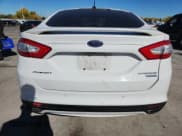 ✅ 2016 Ford Fusion Titanium • VIN: 3FA6P0K97GR135641 • Lot: 86659505. Wystawiony na Copart z przebiegiem 197 617 mil. Bezpłatny archiwum sprzedaży aukcyjnych z USA i szczegółowy raport historii pojazdu na DreamBid. Zdjęcie 6.