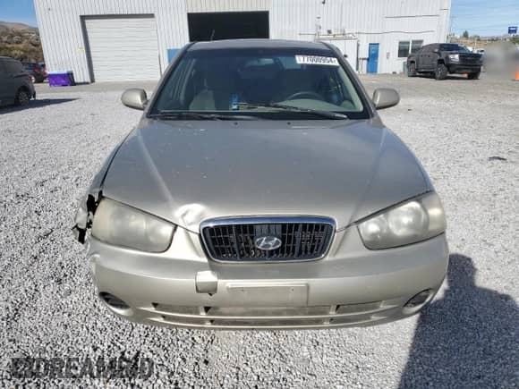 2002 Hyundai Elantra GLS z VIN KMHDN45D22U371819, wystawiony jako Copart lot #77000954 z przebiegiem 177 202 mil mil oraz Szkoda całkowita • Salvage title. Historia ofert i sprzedaży dostępna na DreamBid. Obrazek 5.