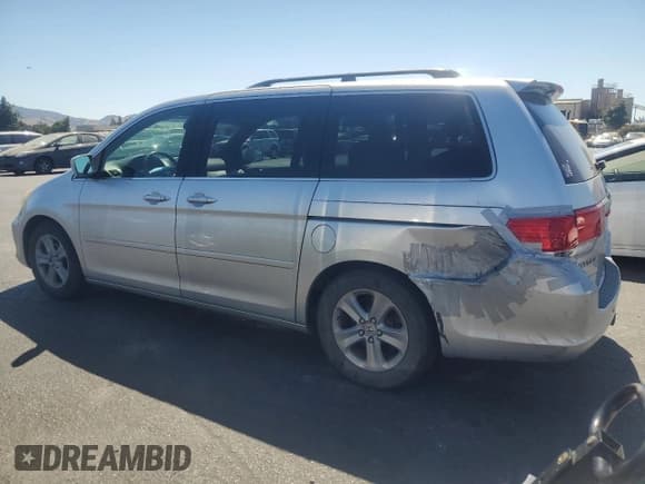 ✅ 2010 Honda Odyssey Touring • VIN: 5FNRL3H96AB027502 • Лот: 69539685. Опубликован ранее на Copart с пробегом 200 214 миль. Бесплатный доступ к архиву аукционных продаж из США и подробный отчёт об истории автомобиля на DreamBid. Изображение 2.