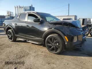 2024 Hyundai Santa Cruz Night Edition с VIN 5NTJCDDF7RH102110, выставлен на аукционе Copart как лот 75322214 с пробегом Не указан миль и Списание • Salvage title. История ставок и продаж доступна на DreamBid. Изображение 4.