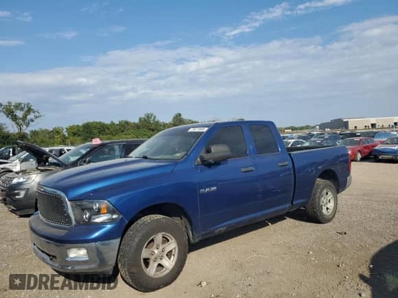 2009 Dodge 1500 ST with VIN 1D3HV18P19S757297, listed as a Copart auction lot 71671945 with 149,796 mi miles and Salvage title. Bid and sale history available at DreamBid. Image 1.