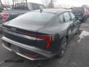 ✅ 2025 Kia K4 LXS • VIN: 3KPFT4DEXSE164574 • Lot: 43559859. Listed on IAAI with 3,764 mi. Free auction sales archive from the USA and detailed vehicle history report at DreamBid. Image 4.