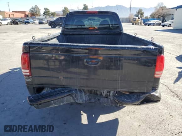 1998 Dodge Dakota SLT z VIN 1B7GL22Y2WS586735, wystawiony jako Copart lot #43035875 z przebiegiem 232 586 mil mil oraz Szkoda całkowita • Salvage title. Historia ofert i sprzedaży dostępna na DreamBid. Obrazek 6.