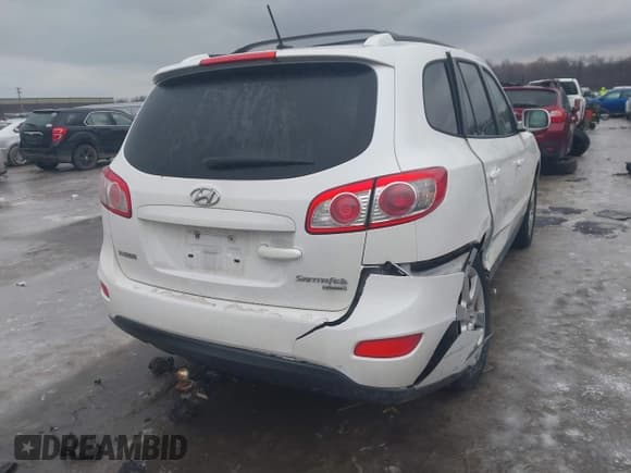 ✅ 2011 Hyundai Santa Fe Limited • VIN: 5XYZHDAGXBG008896 • Lot: 41564444. Listed on IAAI with 122,104 mi. Free auction sales archive from the USA and detailed vehicle history report at DreamBid. Image 4.