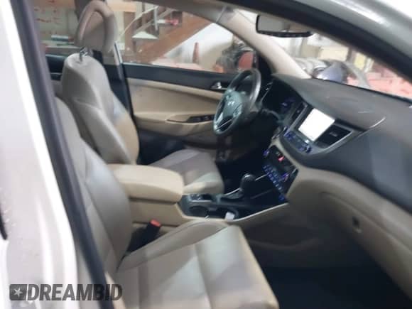 2018 Hyundai Tucson Limited with VIN KM8J33A21JU622755, listed as a IAAI auction lot 41545445 with 53,971 mi miles and . Bid and sale history available at DreamBid. Image 5.