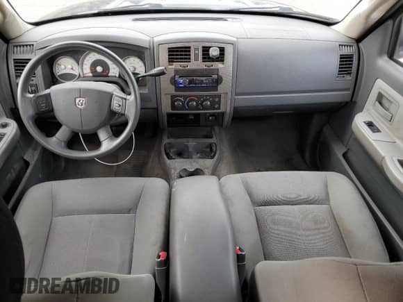 2006 Dodge Dakota SLT z VIN 1D7HW48N56S678965, wystawiony jako Copart lot #70227054 z przebiegiem 159 890 mil mil oraz Szkoda całkowita • Salvage title. Historia ofert i sprzedaży dostępna na DreamBid. Obrazek 8.