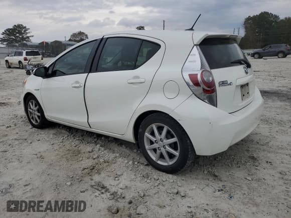 ✅ 2013 Toyota Prius One • VIN: JTDKDTB34D1556091 • Lot: 90696085. Listed on Copart with 56,741 mi. Free auction sales archive from the USA and detailed vehicle history report at DreamBid. Image 2.