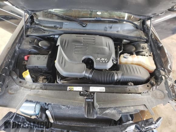 ✅ 2015 Dodge Challenger SXT Plus • VIN: 2C3CDZBG1FH707357 • Lot: 48311712. Wystawiony na Copart z przebiegiem 81 059 mil. Bezpłatny archiwum sprzedaży aukcyjnych z USA i szczegółowy raport historii pojazdu na DreamBid. Zdjęcie 7.