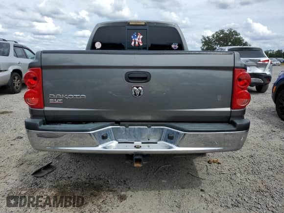 2006 Dodge Dakota SLT с VIN 1D7HE48KX6S526138, выставлен на аукционе Copart как лот 81651565 с пробегом 152 813 миль миль и Списание • Salvage title. История ставок и продаж доступна на DreamBid. Изображение 6.