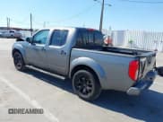 ✅ 2021 Nissan Frontier SV • VIN: 1N6ED0EA7MN706206 • Lot: 43094070. Listed on IAAI with 90,051 mi. Free auction sales archive from the USA and detailed vehicle history report at DreamBid. Image 3.