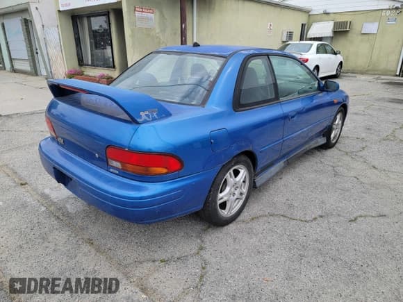 ✅ 1998 Subaru Impreza RS • VIN: JF1GM6757WG401400 • Lot: 56074165. Wystawiony na Copart z przebiegiem 216 448 mil. Bezpłatny archiwum sprzedaży aukcyjnych z USA i szczegółowy raport historii pojazdu na DreamBid. Zdjęcie 4.