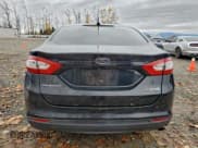 ✅ 2016 Ford Fusion S Hybrid • VIN: 3FA6P0UU1GR118805 • Lot: 93336205. Wystawiony na Copart z przebiegiem 141 238 mil. Bezpłatny archiwum sprzedaży aukcyjnych z USA i szczegółowy raport historii pojazdu na DreamBid. Zdjęcie 6.