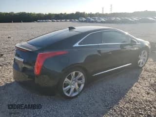 ✅ 2014 Cadillac ELR • VIN: 1G6RL1E4XEU602018 • Lot: 74824784. Wystawiony na Copart z przebiegiem 90 159 mil. Bezpłatny archiwum sprzedaży aukcyjnych z USA i szczegółowy raport historii pojazdu na DreamBid. Zdjęcie 3.