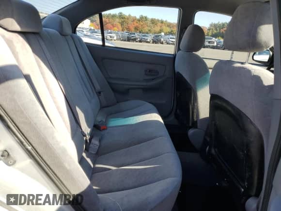 2004 Hyundai Elantra GLS z VIN KMHDN46DX4U768034, wystawiony jako Copart lot #76914334 z przebiegiem 73 957 mil mil oraz Szkoda całkowita • Salvage title. Historia ofert i sprzedaży dostępna na DreamBid. Obrazek 10.