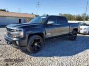 ✅ 2018 Chevrolet Silverado 1500 High Country • VIN: 3GCUKTEC6JG423100 • Лот: 86311705. Опубликован ранее на Copart с пробегом 83 264 миль. Бесплатный доступ к архиву аукционных продаж из США и подробный отчёт об истории автомобиля на DreamBid. Изображение 1.