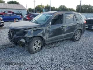 2010 Hyundai Santa Fe GLS with VIN 5NMSGDAB7AH379737, listed as a Copart auction lot 68457484 with 183,254 mi miles and Salvage title. Bid and sale history available at DreamBid. Image 1.