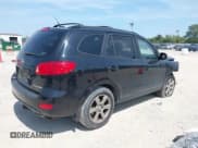 ✅ 2009 Hyundai Santa Fe SE • VIN: 5NMSH13E79H267440 • Lot: 40179268. Listed on IAAI with 141,541 mi. Free auction sales archive from the USA and detailed vehicle history report at DreamBid. Image 4.