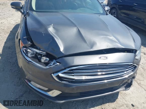 ✅ 2018 Ford Fusion Titanium • VIN: 3FA6P0RU9JR207022 • Lot: 42627542. Listed on IAAI with 155,973 mi. Free auction sales archive from the USA and detailed vehicle history report at DreamBid. Image 6.