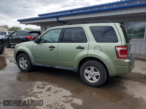 ✅ 2010 Ford Escape Hybrid • VIN: 1FMCU5K31AKA96034 • Lot: 58322125. Listed on Copart with 106,711 mi. Free auction sales archive from the USA and detailed vehicle history report at DreamBid. Image 2.