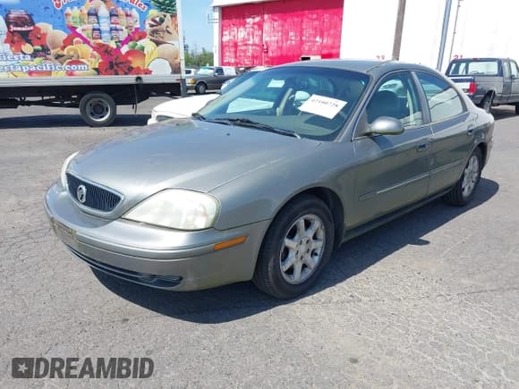 ✅ 2002 Mercury Sable GS • VIN: 1MEFM50U42G638338 • Lot: 42100728. Listed on IAAI with 208,055 mi. Free auction sales archive from the USA and detailed vehicle history report at DreamBid. Image 2.