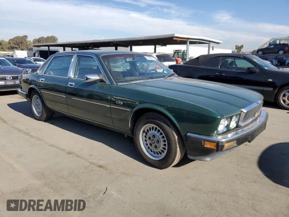 ✅ 1989 Jaguar XJ • VIN: SAJHY1649KC553759 • Лот: 42265145. Опубликован ранее на Copart с пробегом 81 668 миль. Бесплатный доступ к архиву аукционных продаж из США и подробный отчёт об истории автомобиля на DreamBid. Изображение 4.