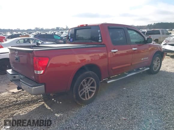 ✅ 2015 Nissan Titan SV • VIN: 1N6BA0ED1FN503871 • Lot: 41491164. Listed on IAAI with 168,793 mi. Free auction sales archive from the USA and detailed vehicle history report at DreamBid. Image 4.