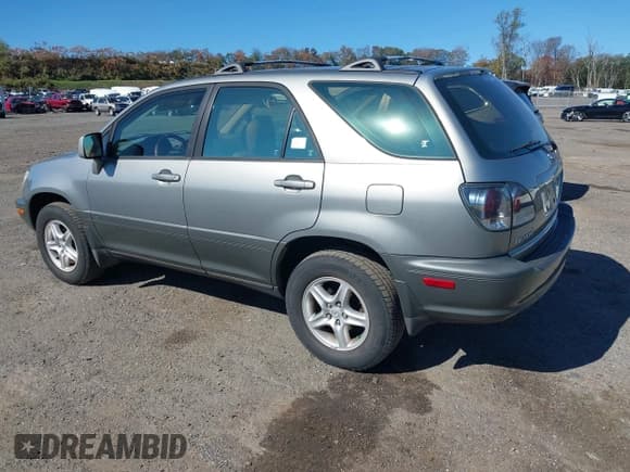 ✅ 2001 Lexus RX 300 • VIN: JTJHF10U710228148 • Lot: 43425523. Wystawiony na IAAI z przebiegiem 164 295 mil. Bezpłatny archiwum sprzedaży aukcyjnych z USA i szczegółowy raport historii pojazdu na DreamBid. Zdjęcie 3.