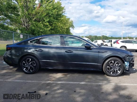 2024 Hyundai Sonata SEL z VIN KMHL64JA1RA411582, wystawiony jako IAAI lot #43092557 z przebiegiem 14 411 mil mil oraz . Historia ofert i sprzedaży dostępna na DreamBid. Obrazek 13.