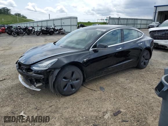 ✅ 2019 Tesla Model 3 Mid Range • VIN: 5YJ3E1EA1KF409991 • Лот: 59198445. Опубликован ранее на Copart с пробегом 69 535 миль. Бесплатный доступ к архиву аукционных продаж из США и подробный отчёт об истории автомобиля на DreamBid. Изображение 1.