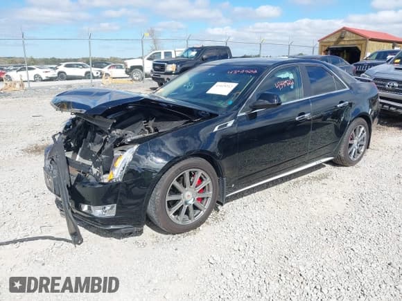 ✅ 2011 Cadillac CTS Premium • VIN: 1G6DP5ED3B0146677 • Lot: 43419212. Listed on IAAI with 66,297 mi. Free auction sales archive from the USA and detailed vehicle history report at DreamBid. Image 2.