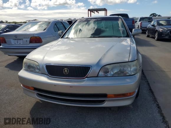 ✅ 1998 Acura TL • VIN: JH4UA3644WC005783 • Лот: 74843514. Опубликован ранее на Copart с пробегом 102 166 миль. Бесплатный доступ к архиву аукционных продаж из США и подробный отчёт об истории автомобиля на DreamBid. Изображение 5.