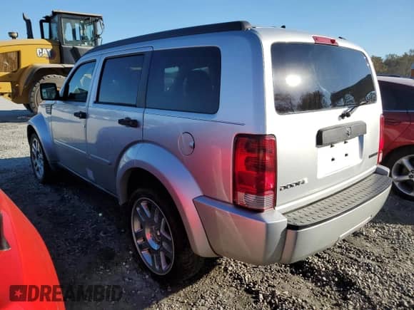 2011 Dodge Nitro Heat с VIN 1D4PT4GK0BW599621, выставлен на аукционе Copart как лот 76164534 с пробегом 213 234 миль миль и На запчасти • Non repairable. История ставок и продаж доступна на DreamBid. Изображение 2.